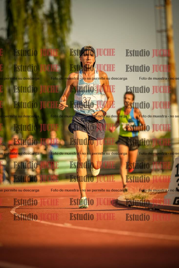 Fotos de los 5000 m llanos de mujeres y varones