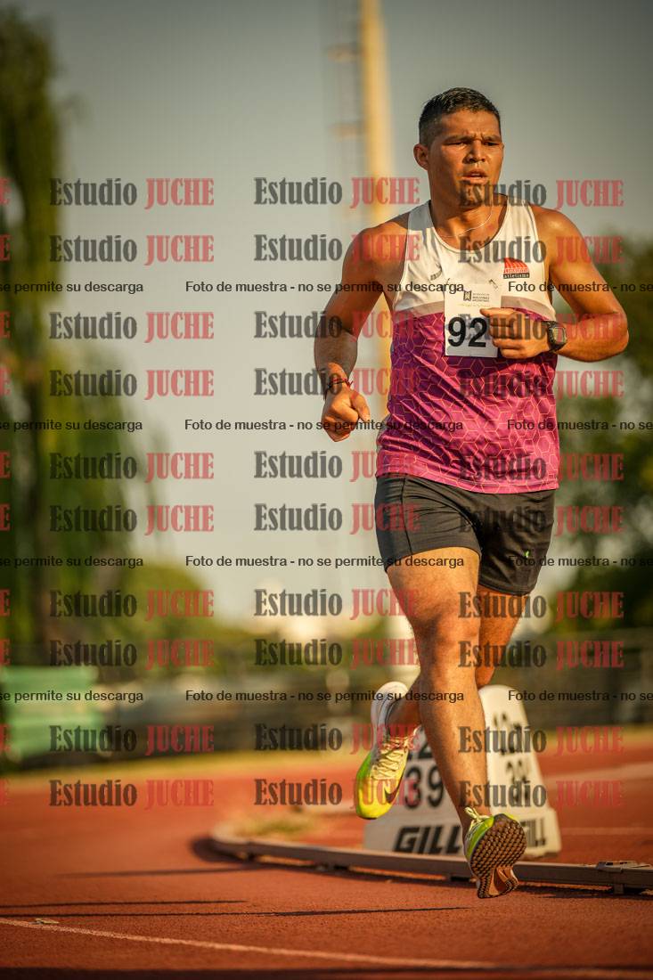 Fotos de los 5000 m llanos de mujeres y varones
