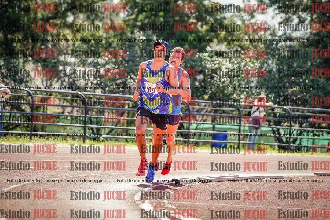 Fotos de los 5000 m llanos de mujeres y varones