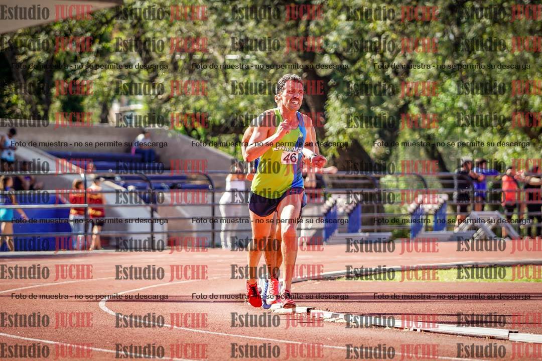 Fotos de los 5000 m llanos de mujeres y varones