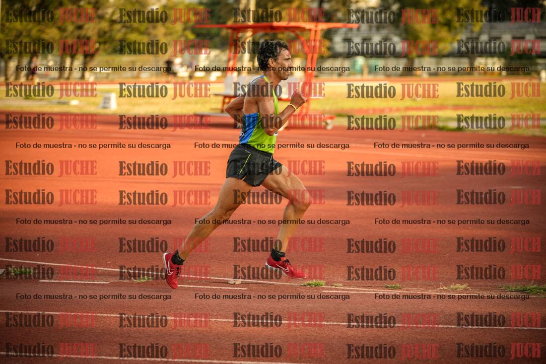 Fotos de los 5000 m llanos de mujeres y varones
