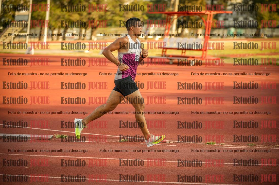 Fotos de los 5000 m llanos de mujeres y varones