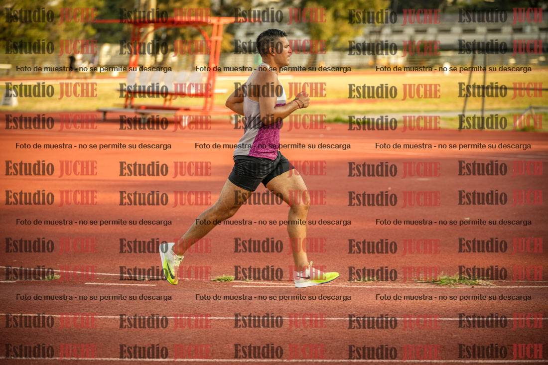 Fotos de los 5000 m llanos de mujeres y varones