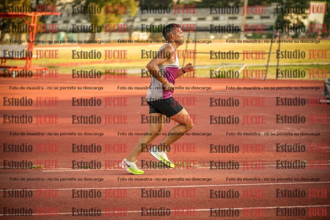 Fotos de los 5000 m llanos de mujeres y varones
