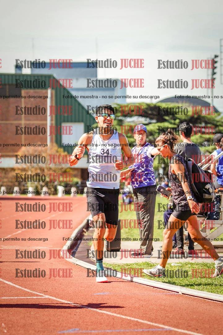 Fotos de los 5000 m llanos de mujeres y varones