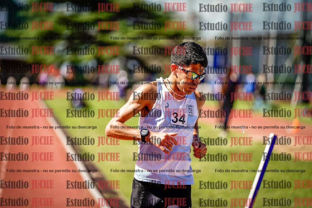 Fotos de los 5000 m llanos de mujeres y varones