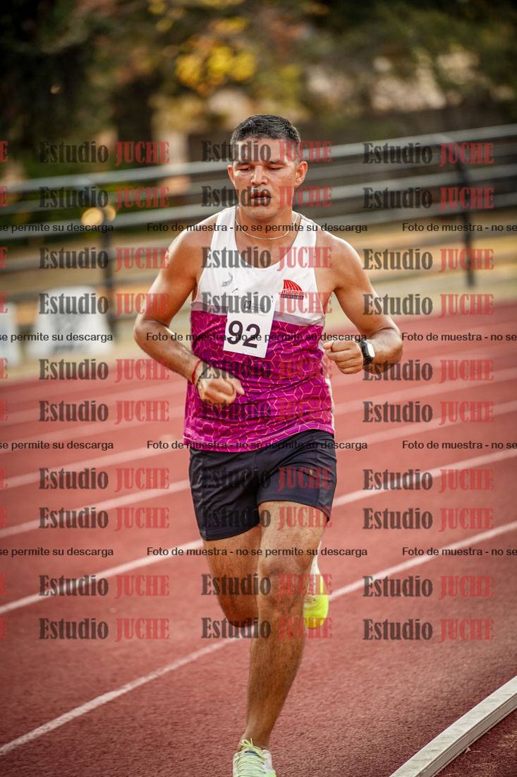 Fotos de los 5000 m llanos de mujeres y varones