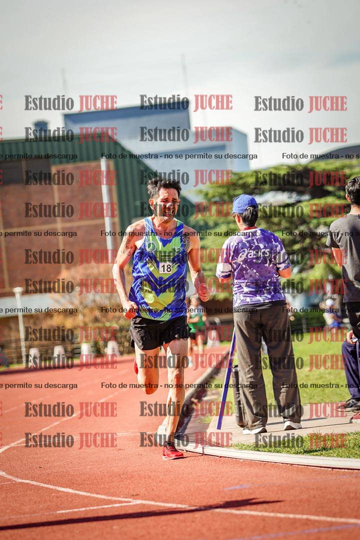 Fotos de los 5000 m llanos de mujeres y varones
