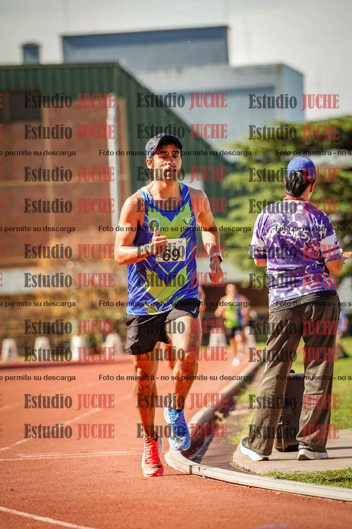 Fotos de los 5000 m llanos de mujeres y varones