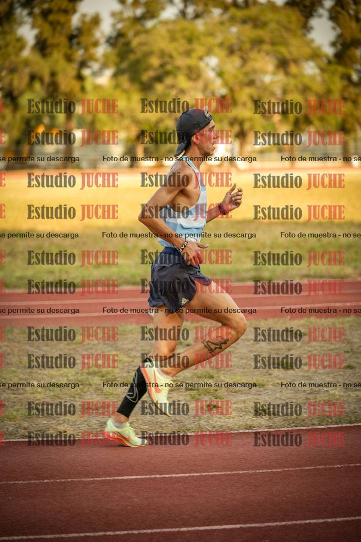 Fotos de los 5000 m llanos de mujeres y varones