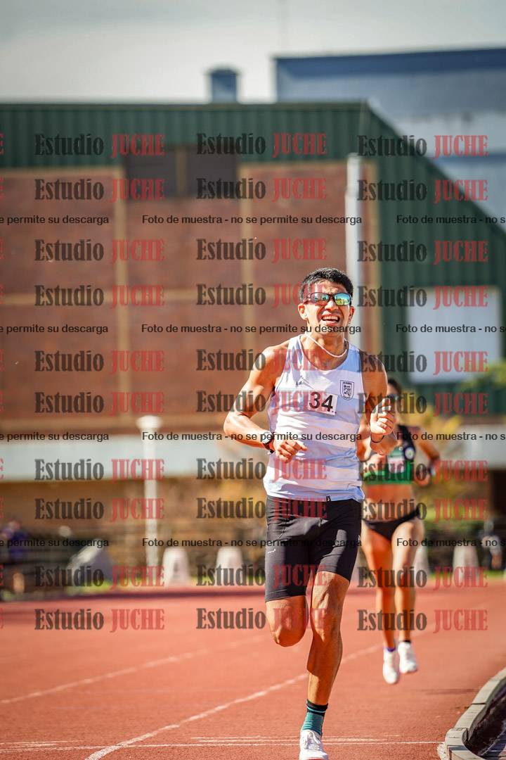 Fotos de los 5000 m llanos de mujeres y varones