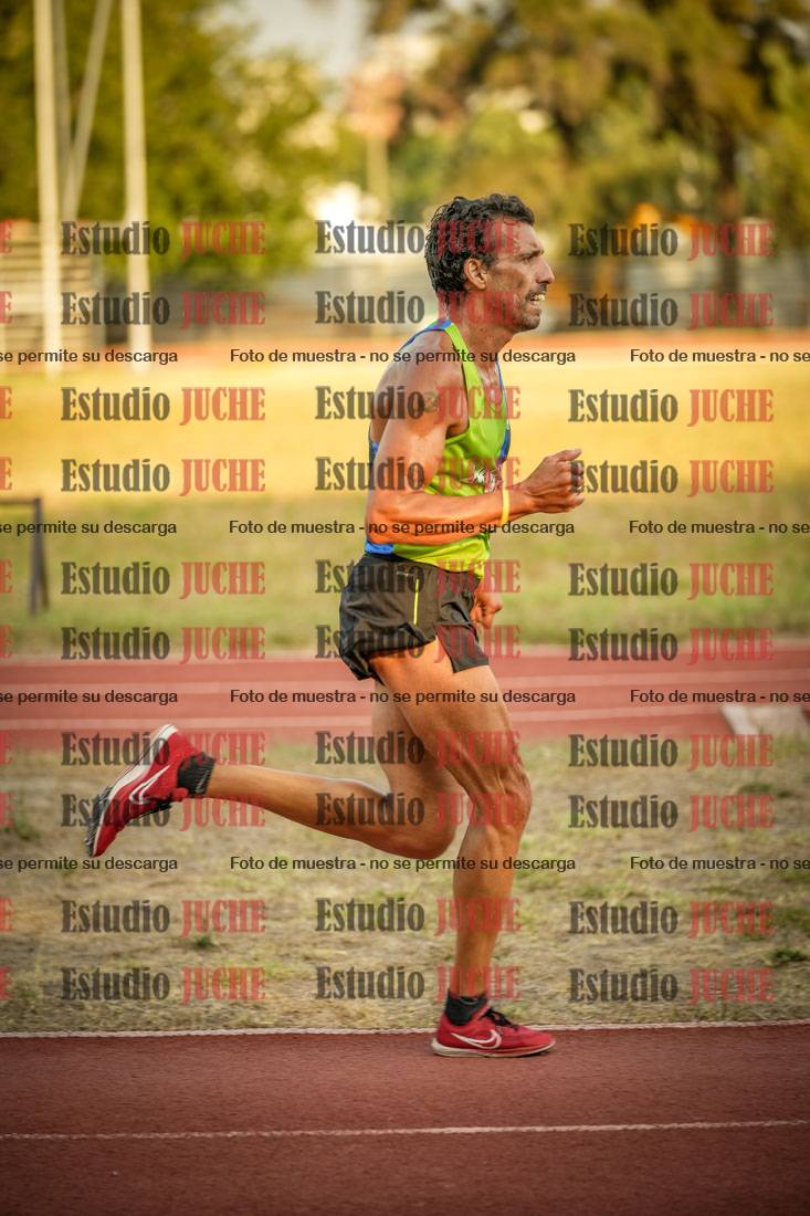 Fotos de los 5000 m llanos de mujeres y varones