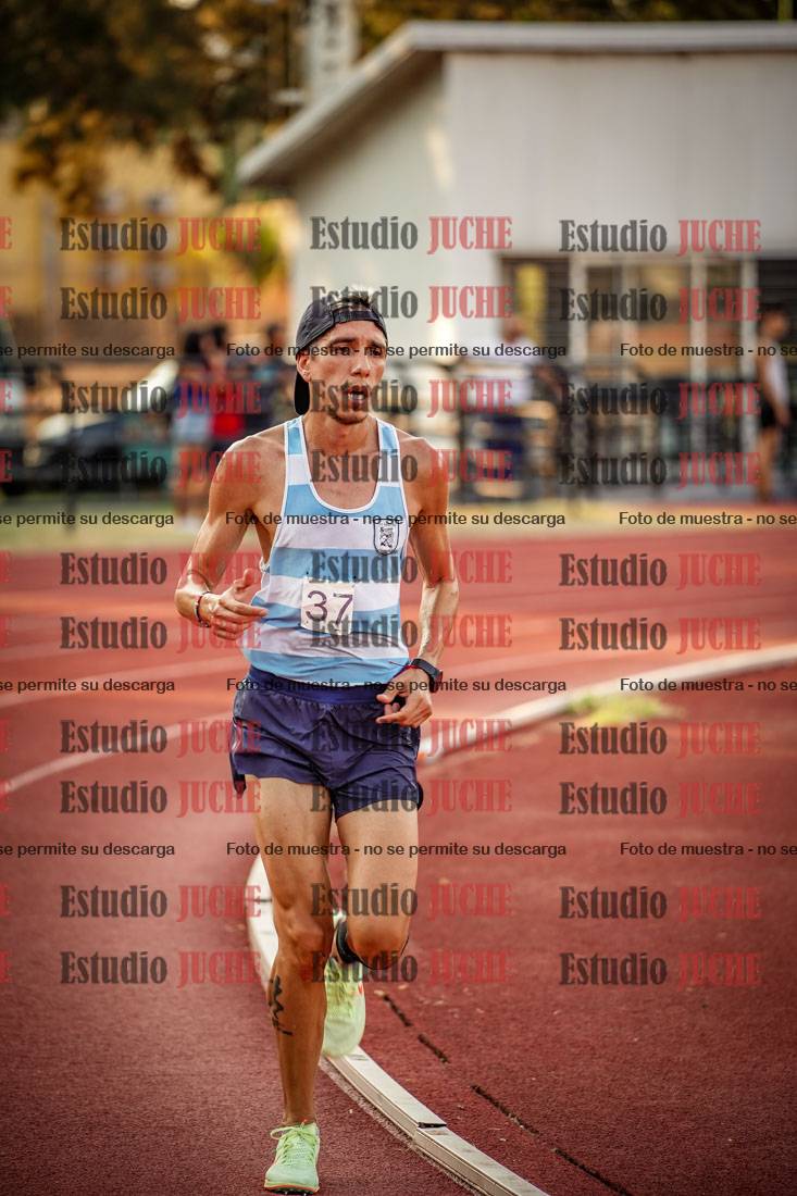 Fotos de los 5000 m llanos de mujeres y varones