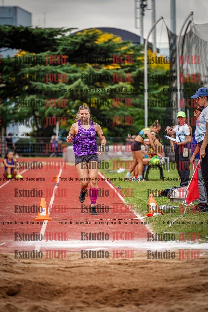 Fotos del salto triple de mujeres y varones