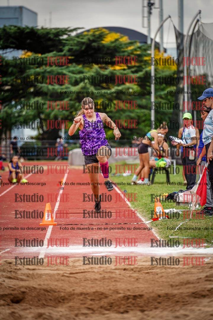 Fotos del salto triple de mujeres y varones