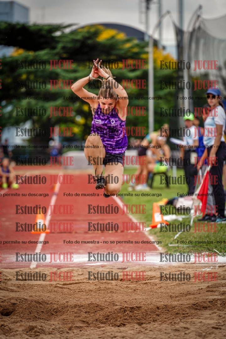 Fotos del salto triple de mujeres y varones