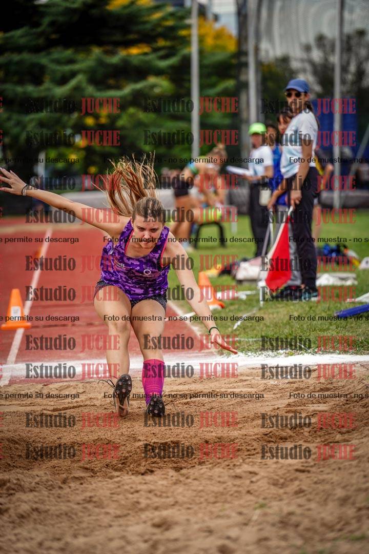 Fotos del salto triple de mujeres y varones