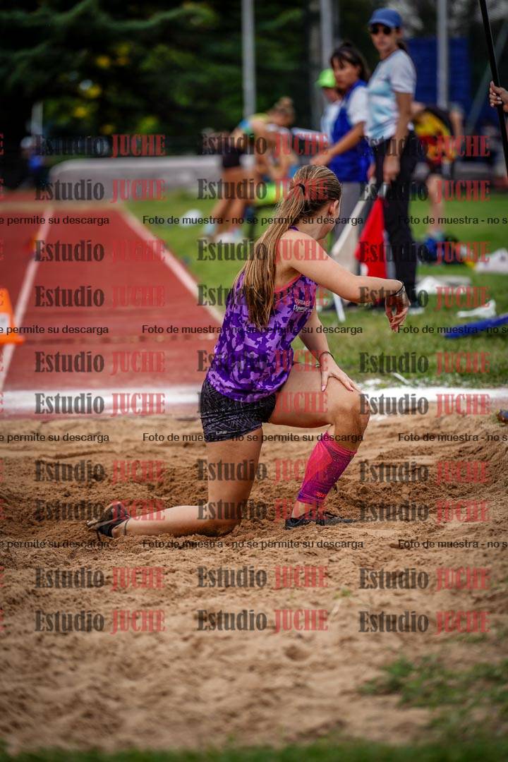 Fotos del salto triple de mujeres y varones