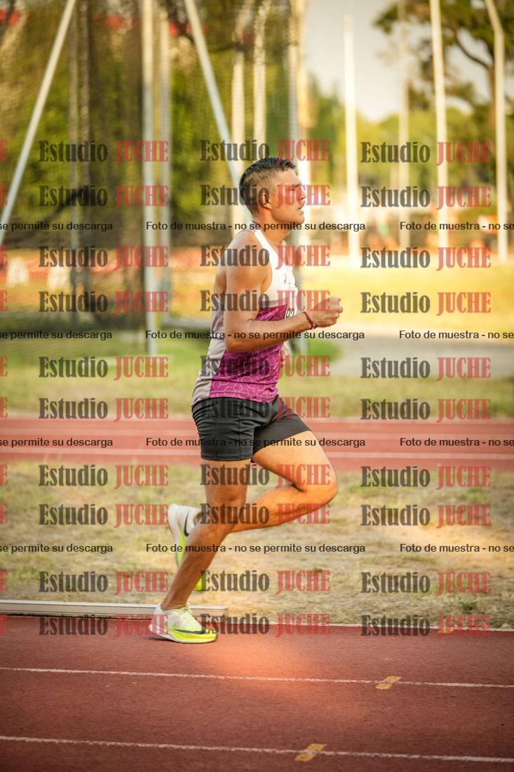 Fotos de los 5000 m llanos de mujeres y varones