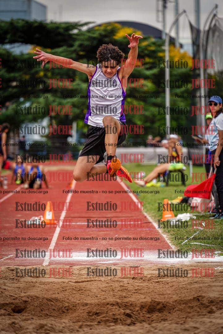 Fotos del salto triple de mujeres y varones