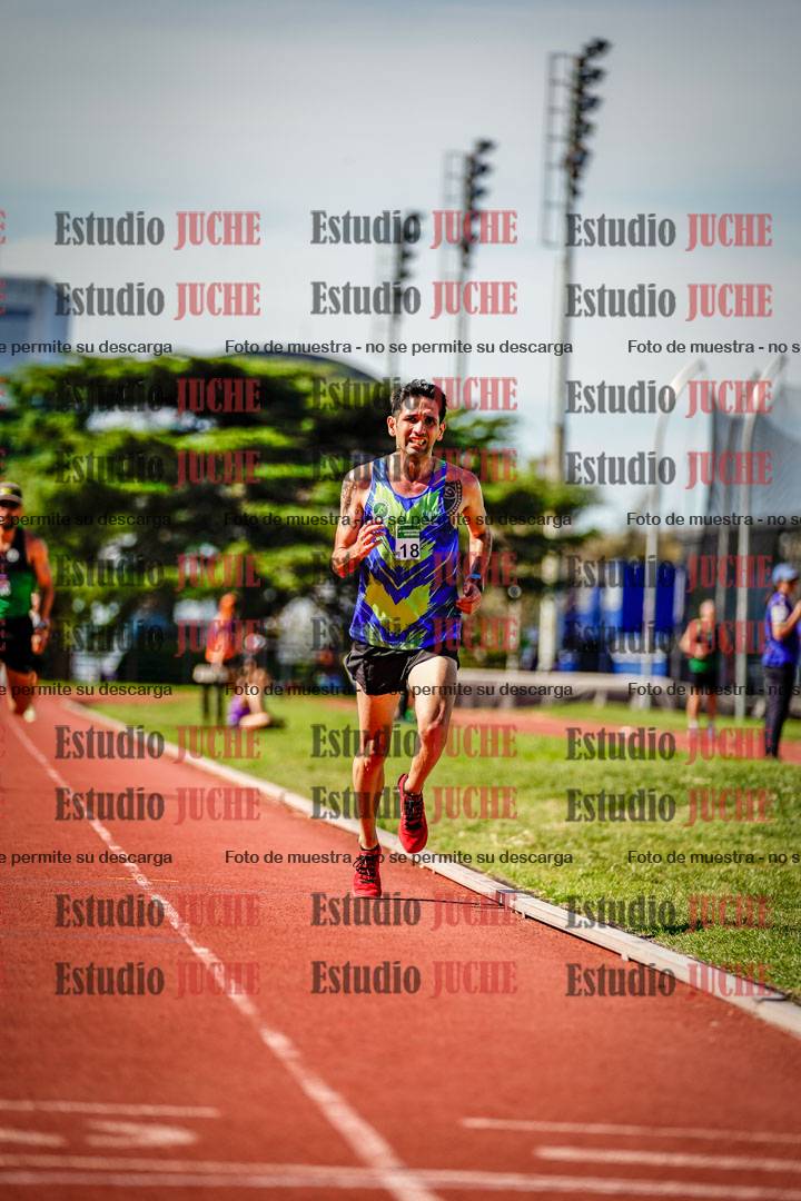 Fotos de los 5000 m llanos de mujeres y varones