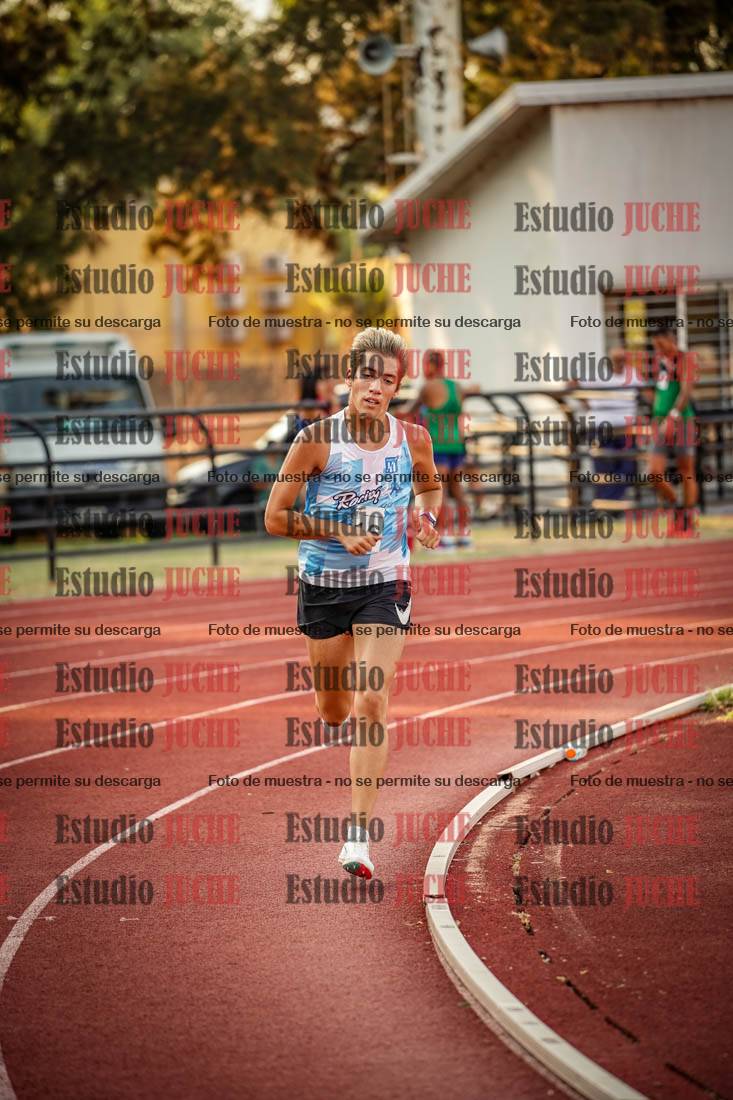 Fotos de los 5000 m llanos de mujeres y varones