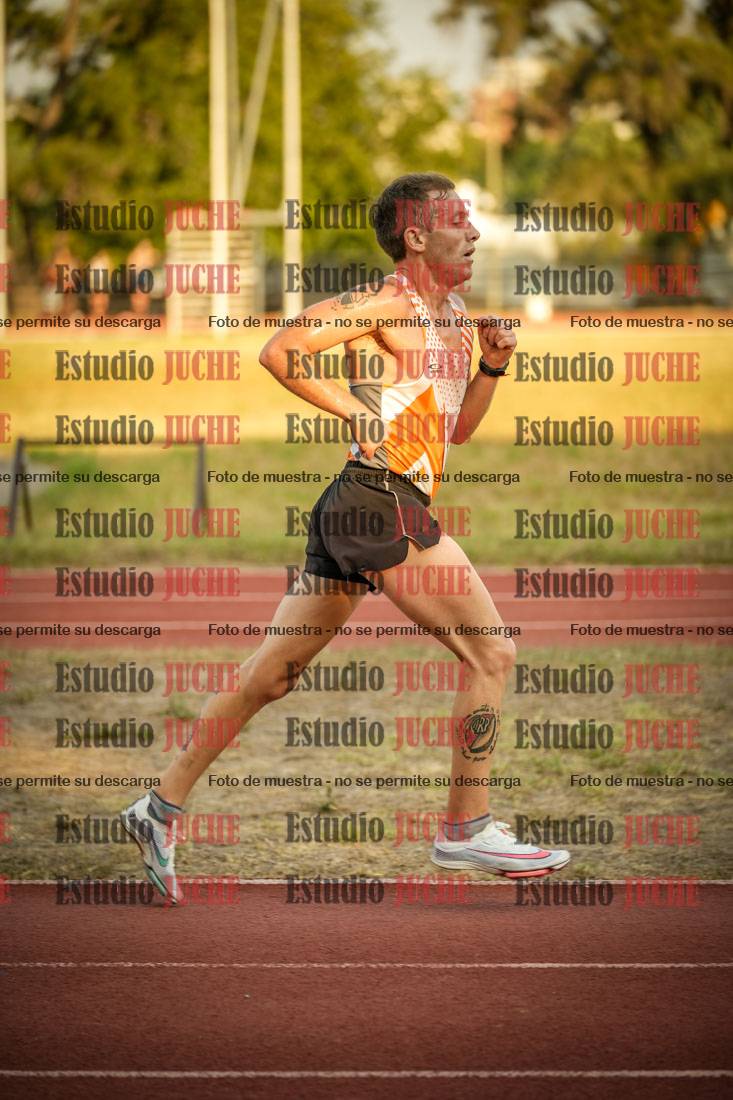 Fotos de los 5000 m llanos de mujeres y varones