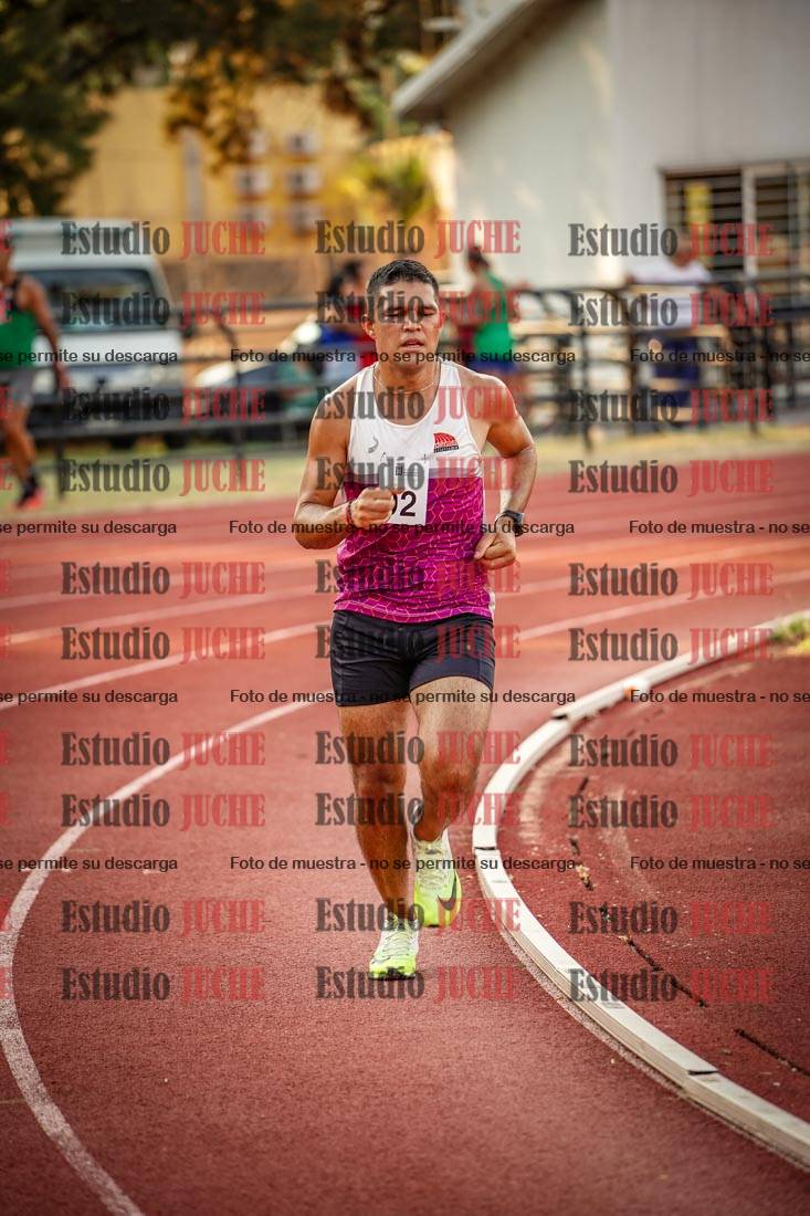 Fotos de los 5000 m llanos de mujeres y varones