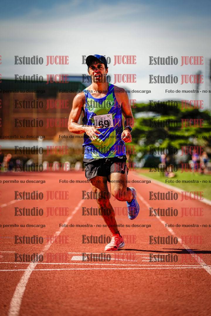 Fotos de los 5000 m llanos de mujeres y varones