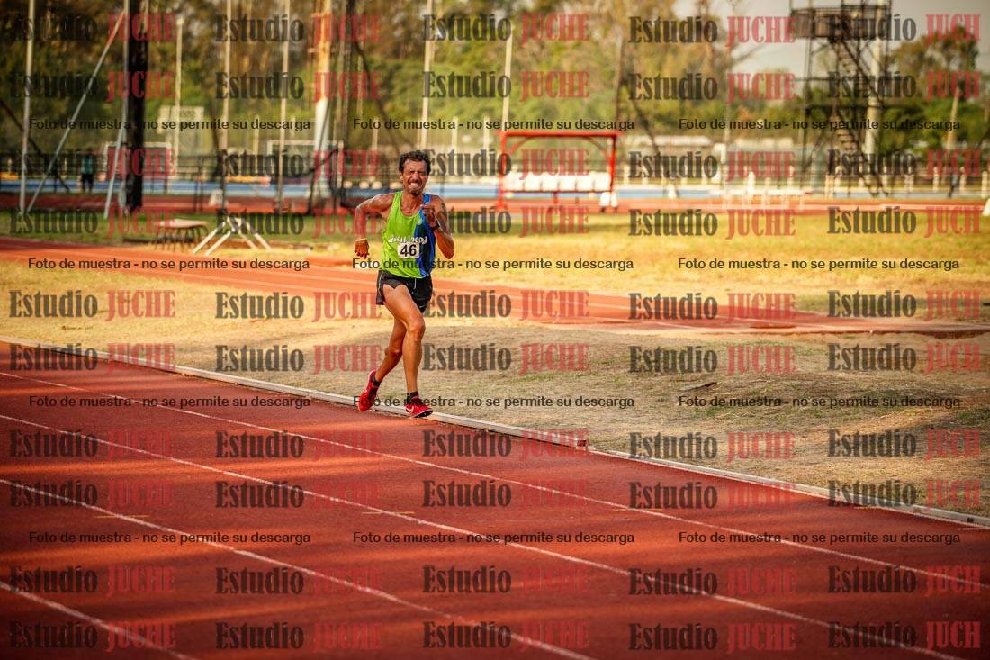 Fotos de los 5000 m llanos de mujeres y varones