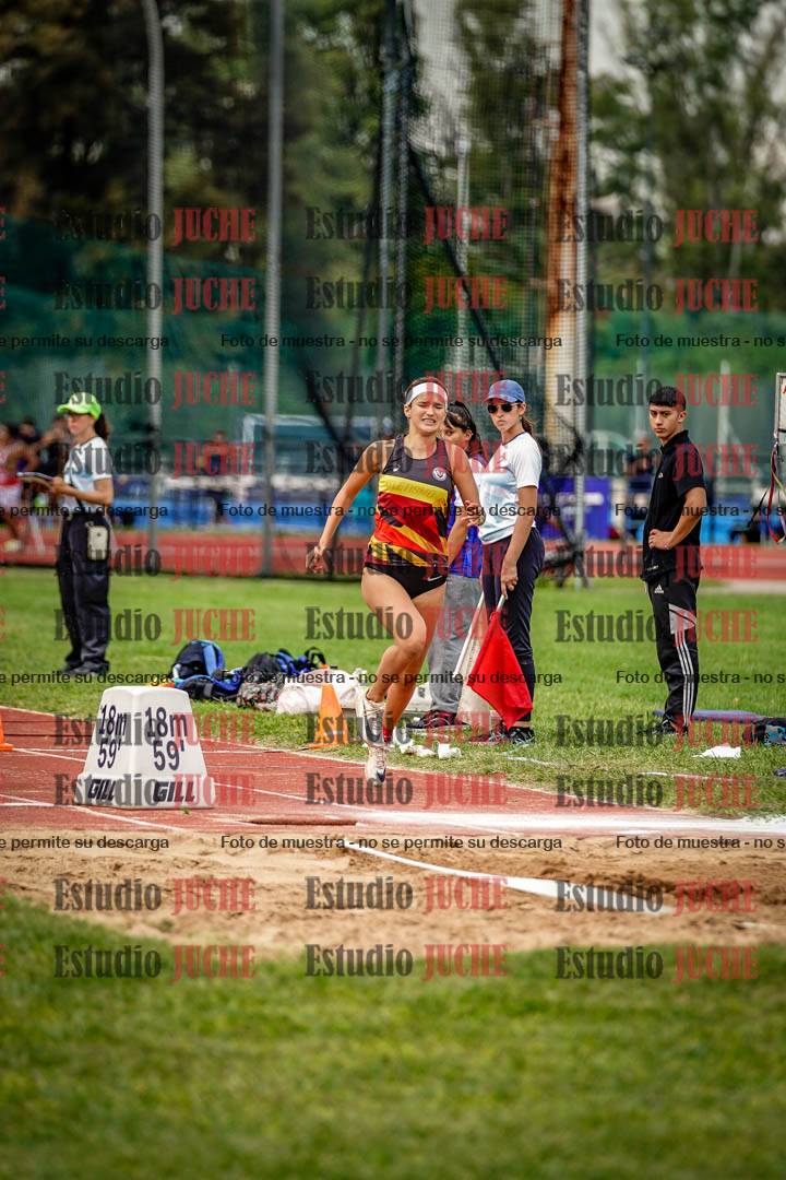 Fotos del salto triple de mujeres y varones