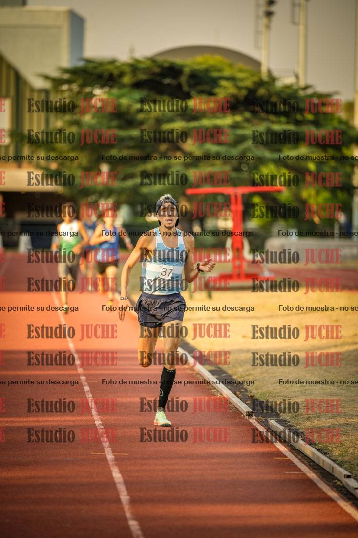 Fotos de los 5000 m llanos de mujeres y varones