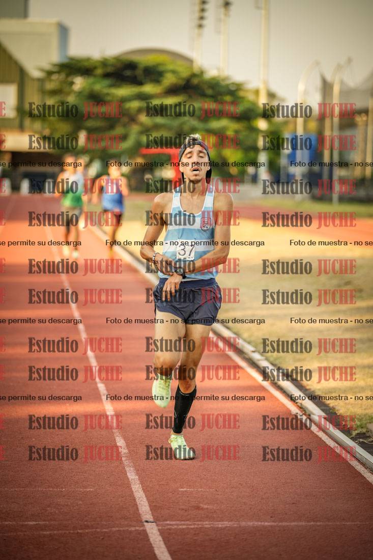 Fotos de los 5000 m llanos de mujeres y varones