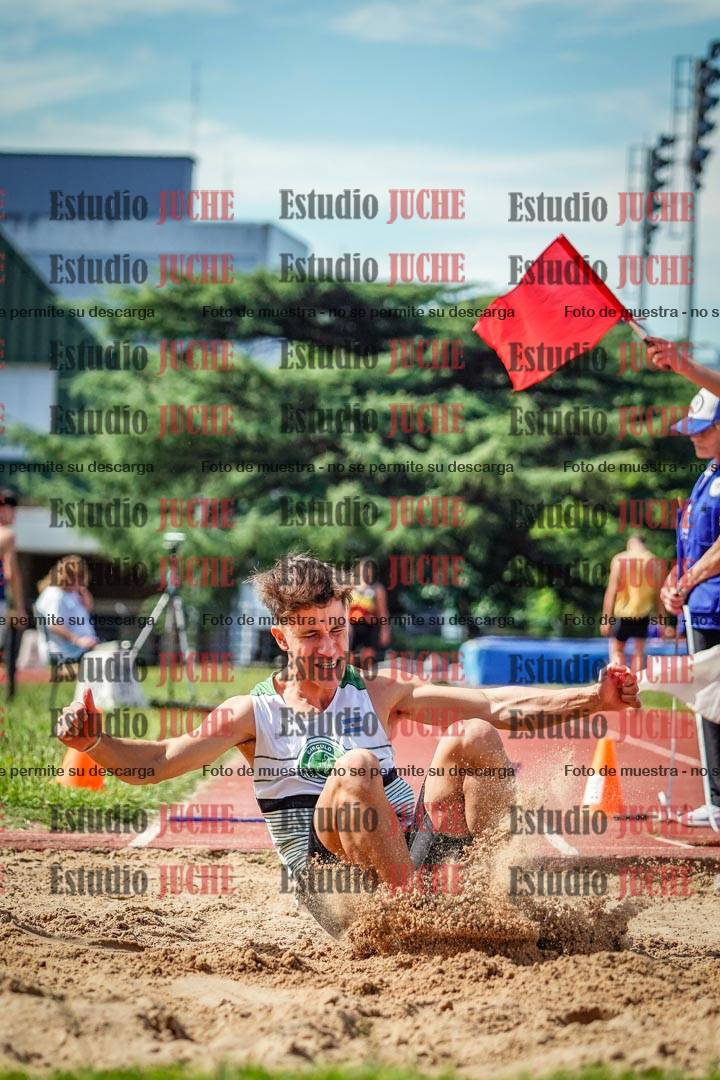 Fotos del salto en largo de varones