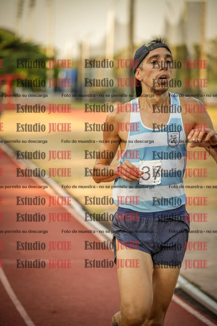 Fotos de los 5000 m llanos de mujeres y varones