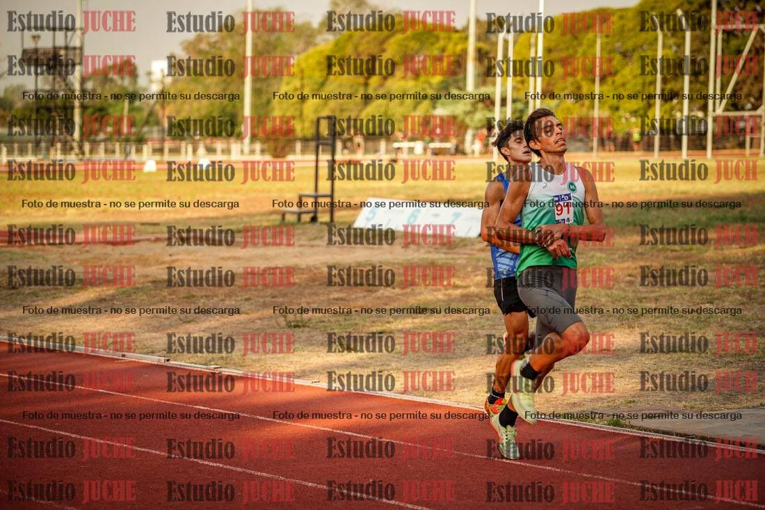 Fotos de los 5000 m llanos de mujeres y varones