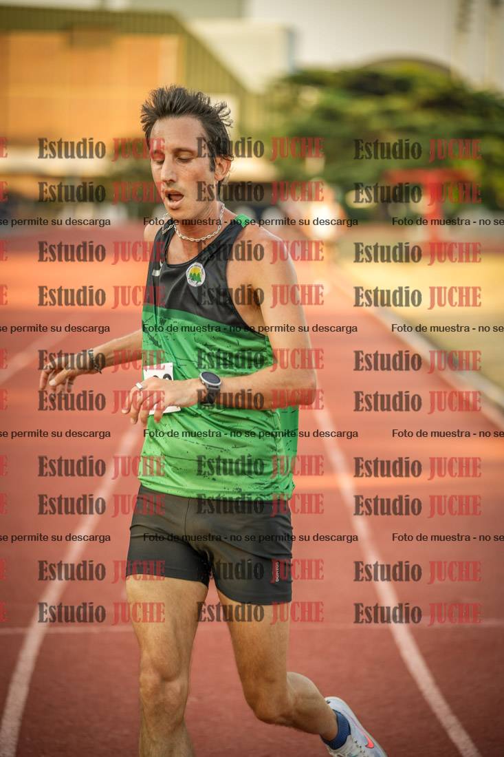 Fotos de los 5000 m llanos de mujeres y varones