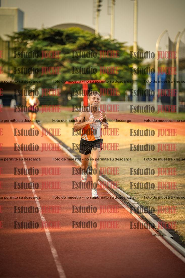 Fotos de los 5000 m llanos de mujeres y varones
