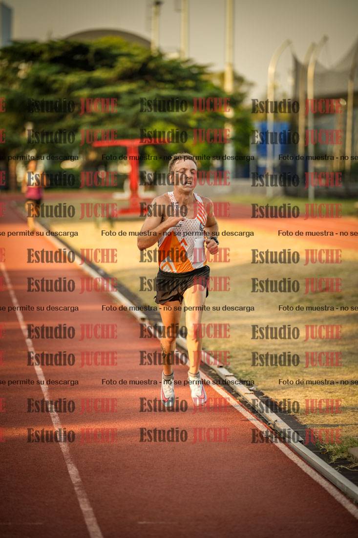 Fotos de los 5000 m llanos de mujeres y varones