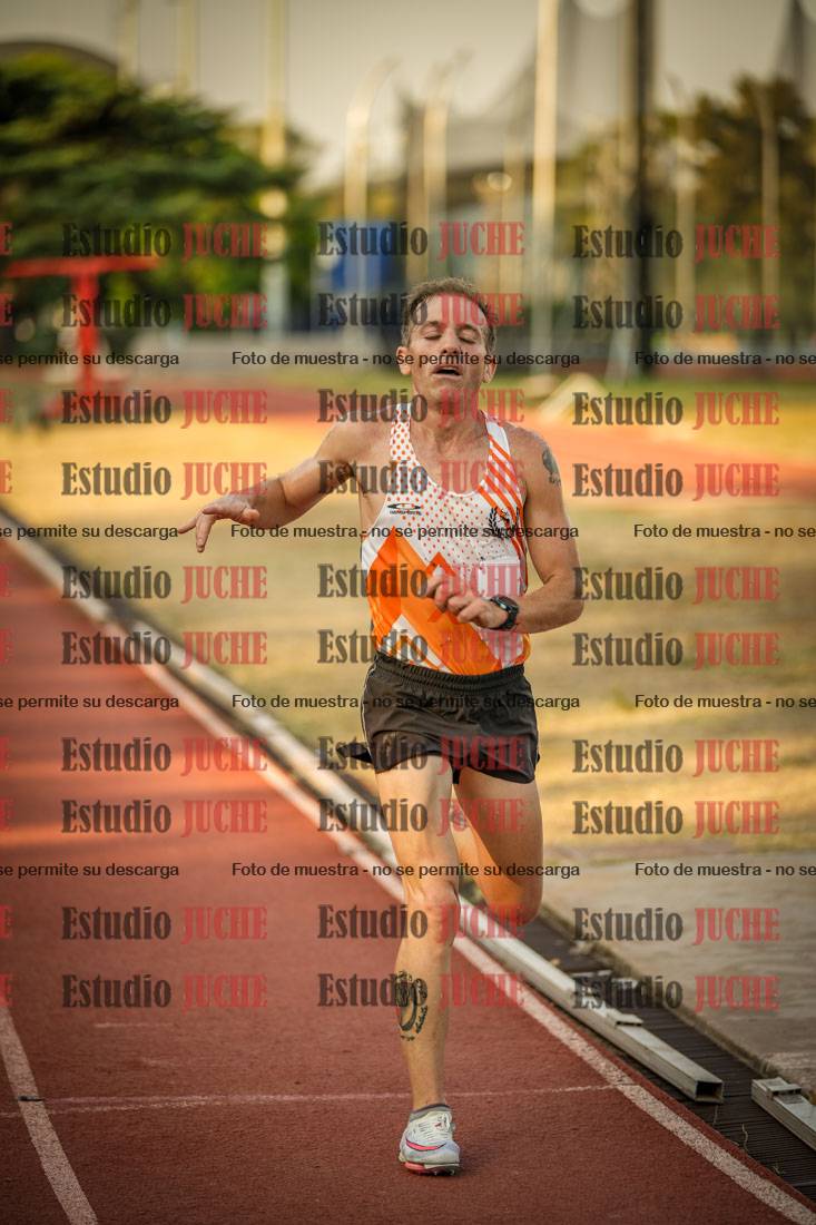 Fotos de los 5000 m llanos de mujeres y varones