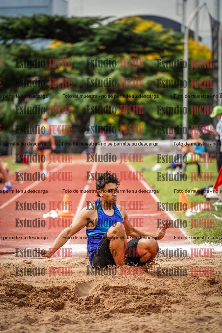 Fotos del salto triple de mujeres y varones