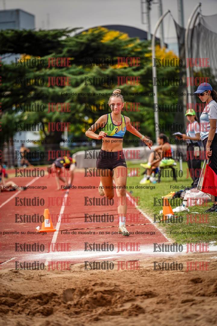 Fotos del salto triple de mujeres y varones