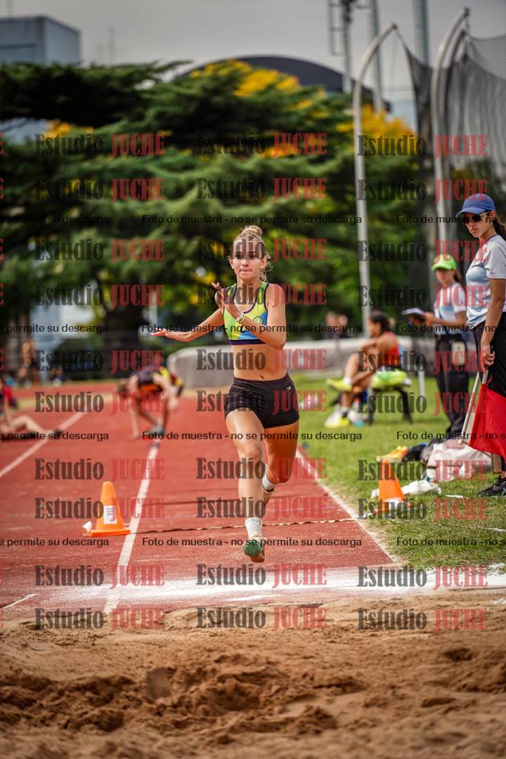 Fotos del salto triple de mujeres y varones