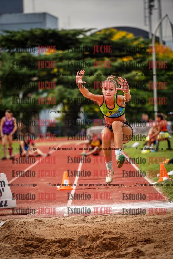 Fotos del salto triple de mujeres y varones