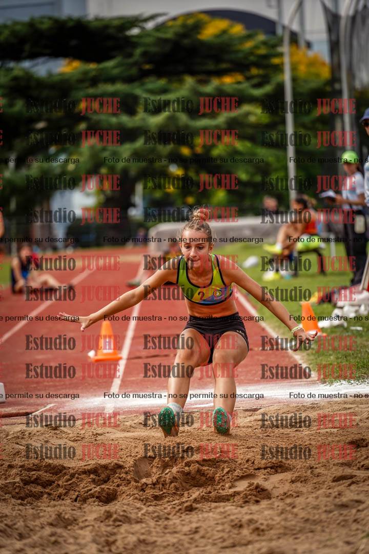 Fotos del salto triple de mujeres y varones
