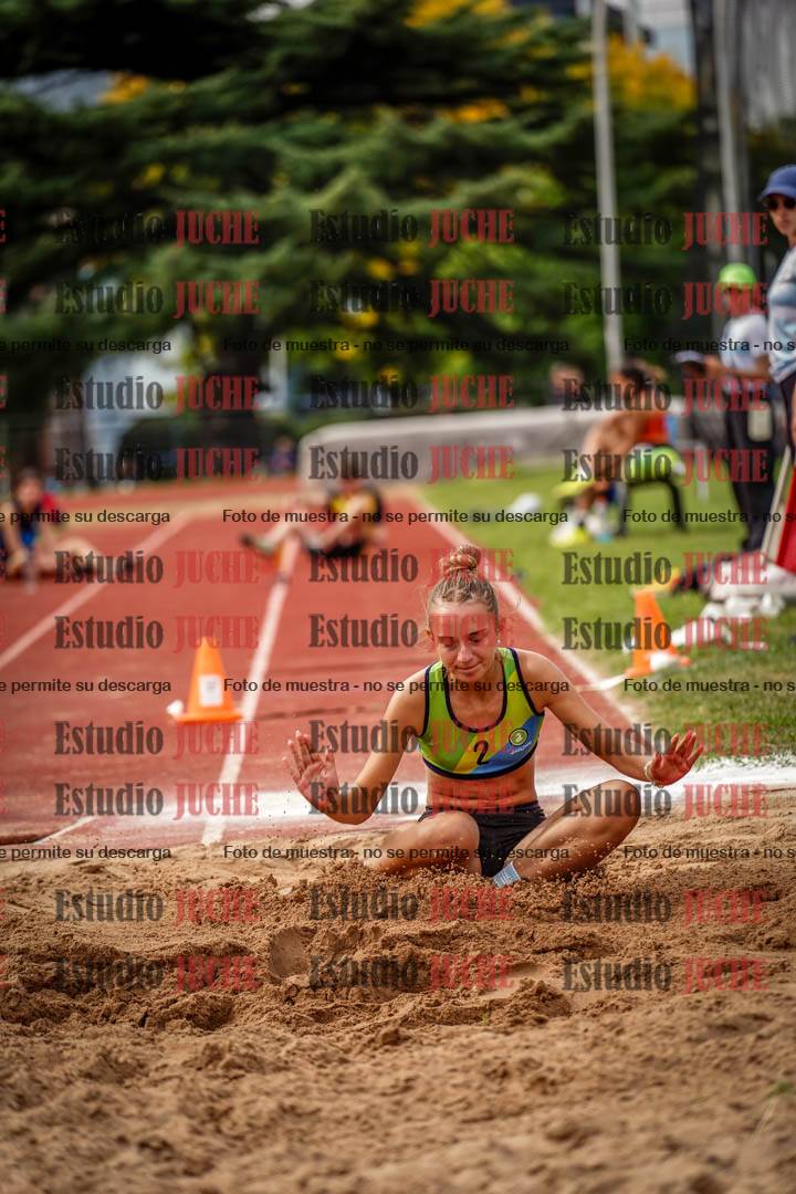 Fotos del salto triple de mujeres y varones