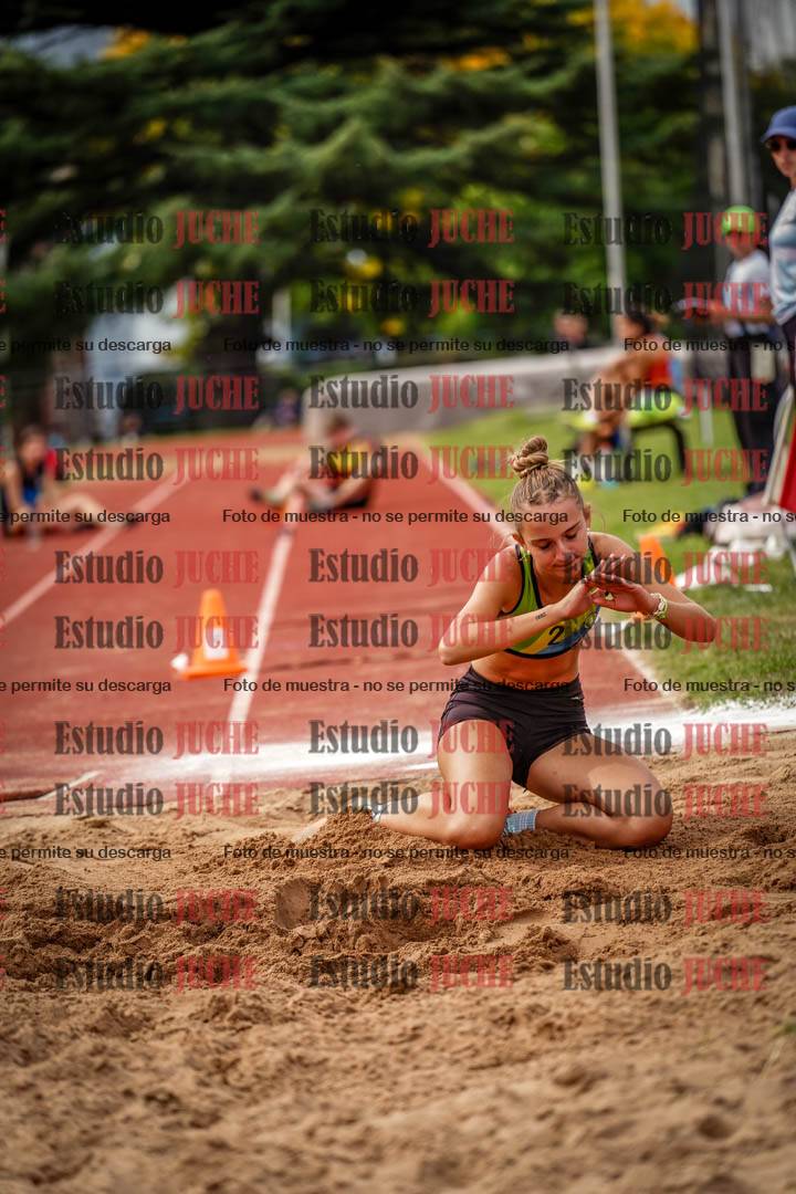 Fotos del salto triple de mujeres y varones
