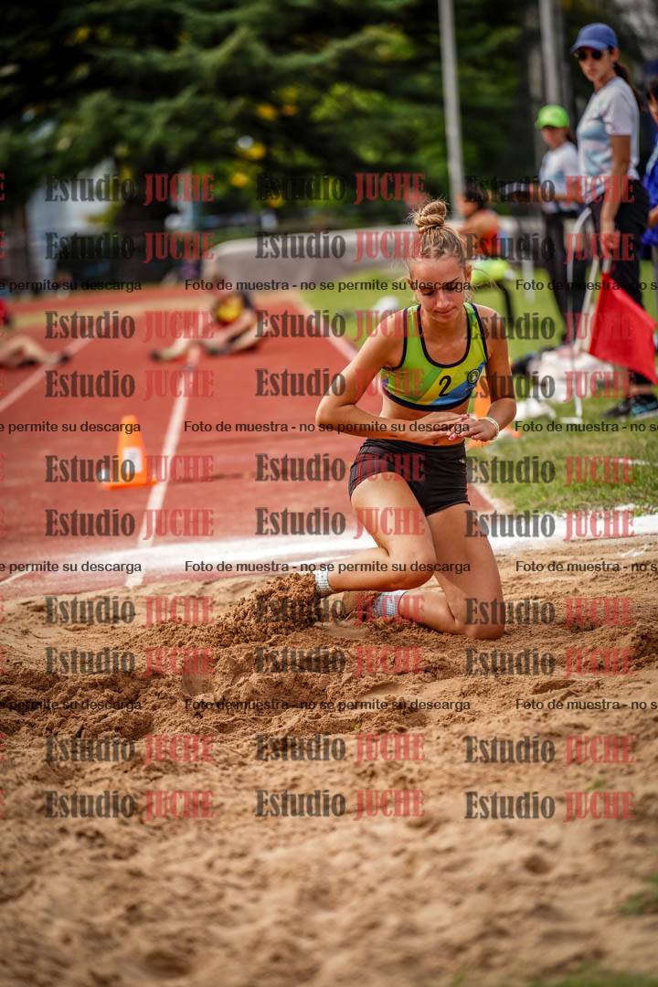 Fotos del salto triple de mujeres y varones