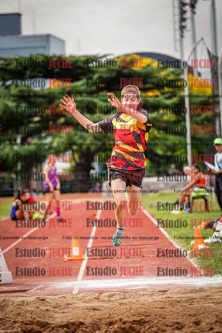 Fotos del salto triple de mujeres y varones