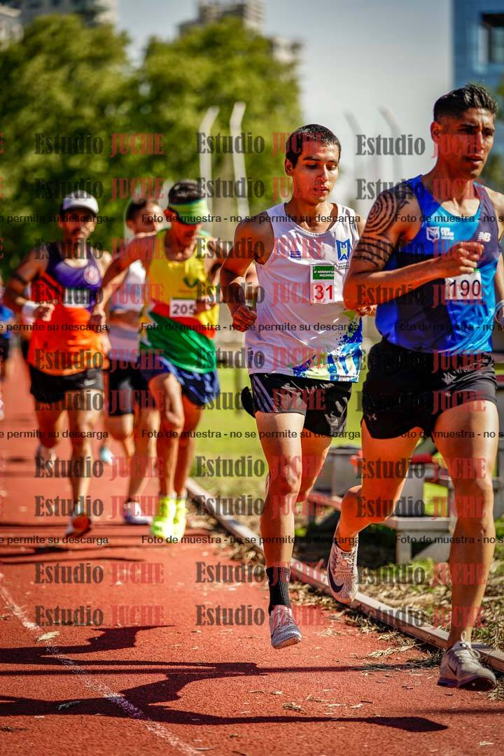Fotos de los 5000 m llanos de mujeres y varones
